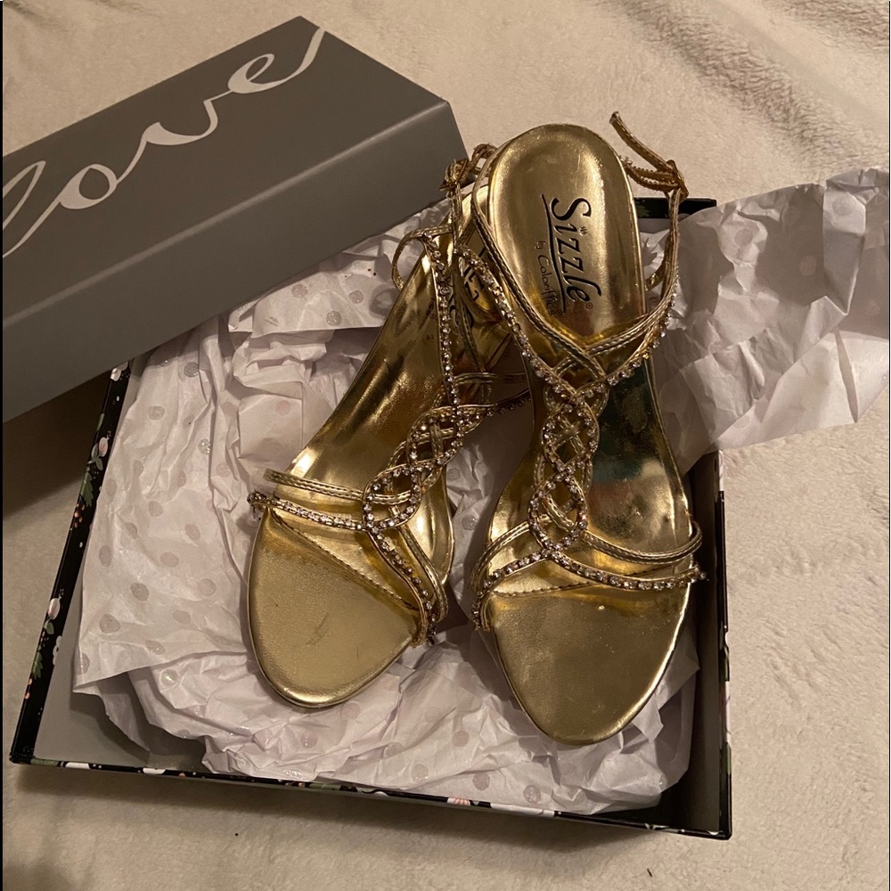 Expensive strappy bedazzled heels